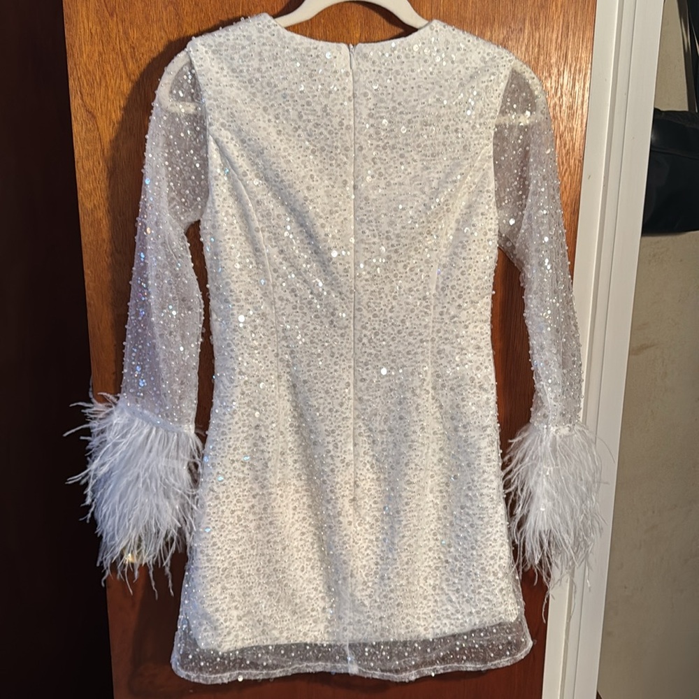 Elegant White Mini Dress with Feather Details
